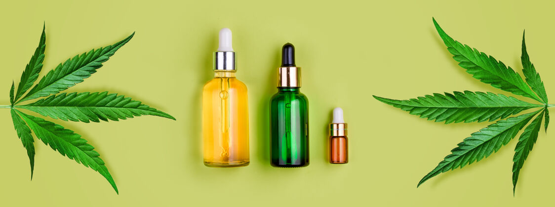玻璃瓶与cbd石油 四氢呋喃酊剂和叶的绿色冷静放松时尚
