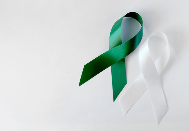 帮助绿色和白色象征丝带医学侦探慈善