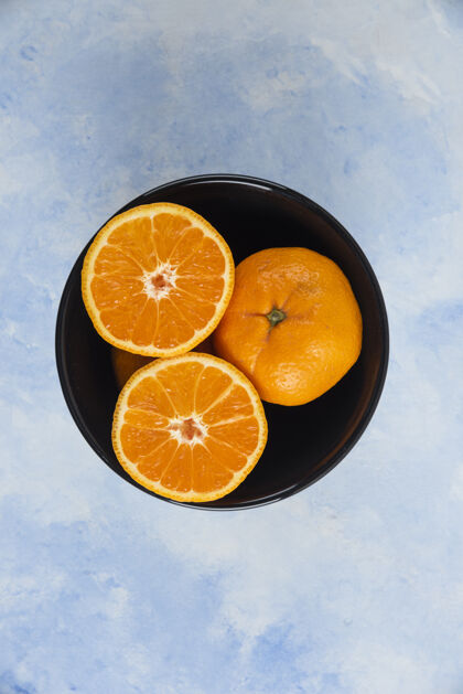 年份顶视图\\碗里的克莱门廷柑桔素食柑橘新鲜
