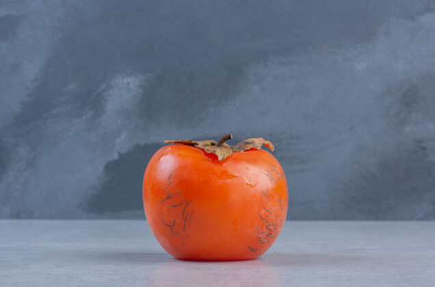 套餐熟透的橘子柿子果实的特写照片抗氧化剂饮食盘子