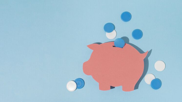 蓝色背景蓝色背景上的小猪存钱罐顶视图框架组成分类