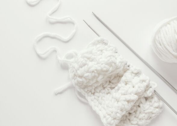 纺织品桌上有针线和羊毛纹理羊毛针织