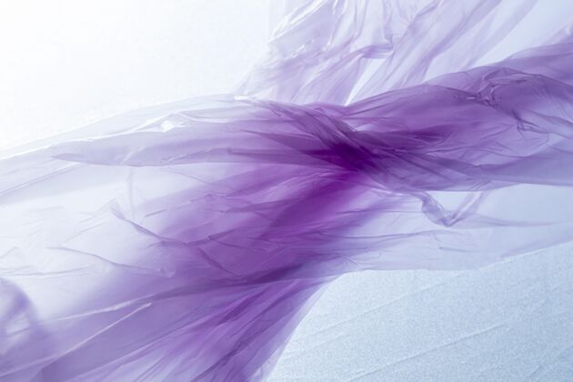 光滑扁平的紫色塑料袋污染皱褶柔软