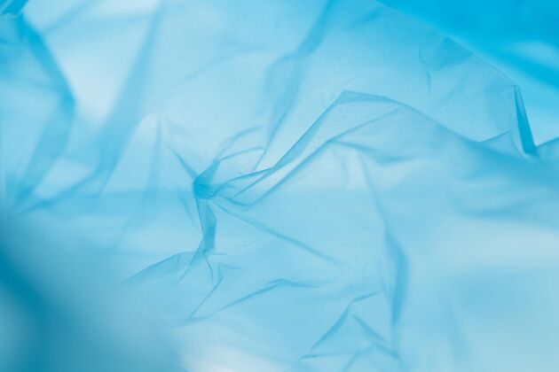 塑料蓝色塑料袋的平面布置壁纸污染光滑