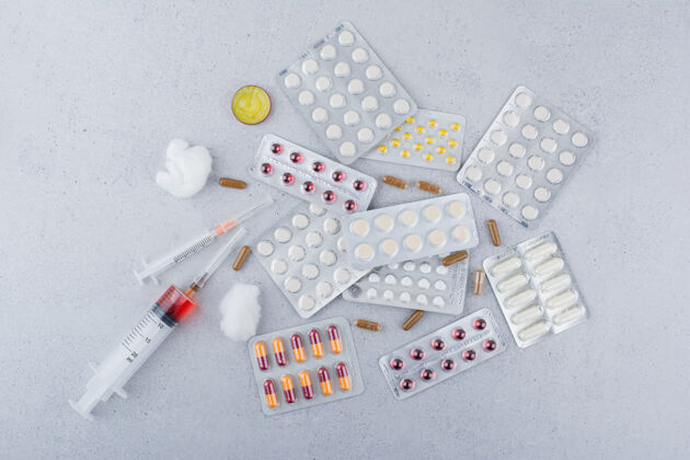 注射剂一堆药品 药丸 胶囊和注射器抗生素包装疾病