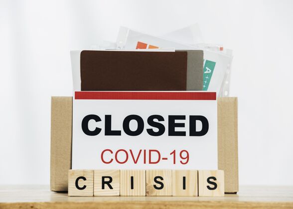 生活方式Covid19标志 箱子满了经济失业金融