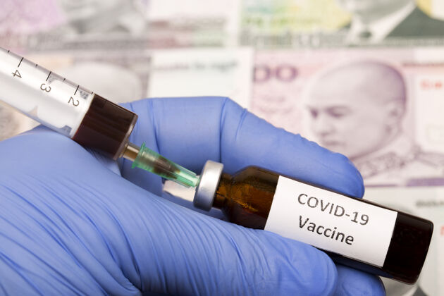 药品以柬埔寨瑞尔为背景的covid-19疫苗注射瓶子处方