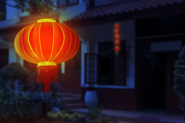 灯笼中国灯笼挂在房子前面 以夜景为背景场景色彩悬挂
