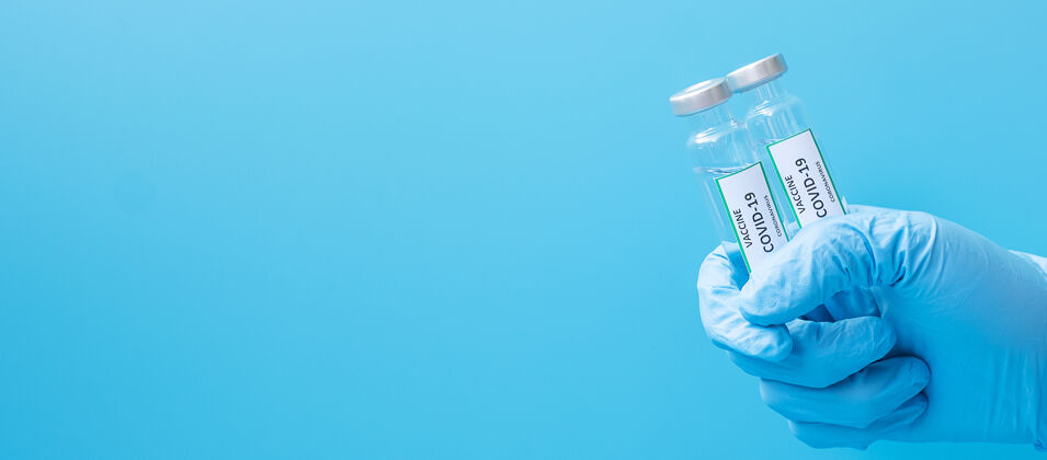 科学家医院内戴丁腈手套的医生手中的冠状病毒19疫苗瓶实验室.医学 健康 预防接种和免疫理念药品保健流感