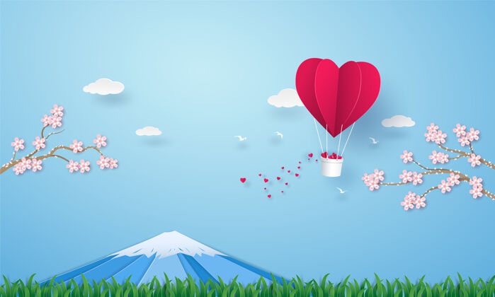 云折纸热气球心在空中飞舞 草丛上有富士山和樱花富士樱花水库