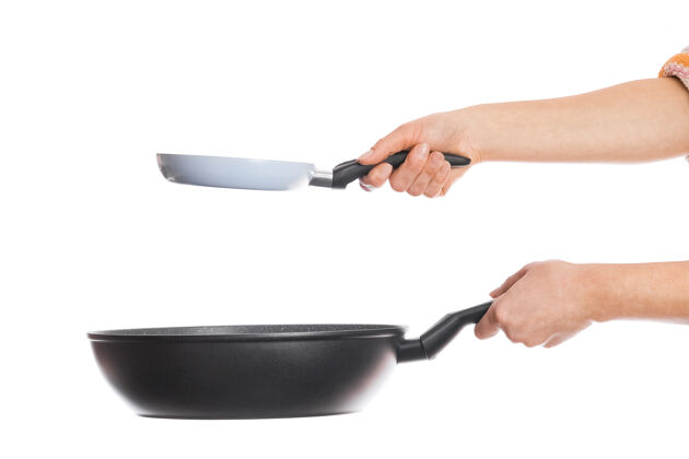 厨具用手在白色背景上平移锅烹饪物体