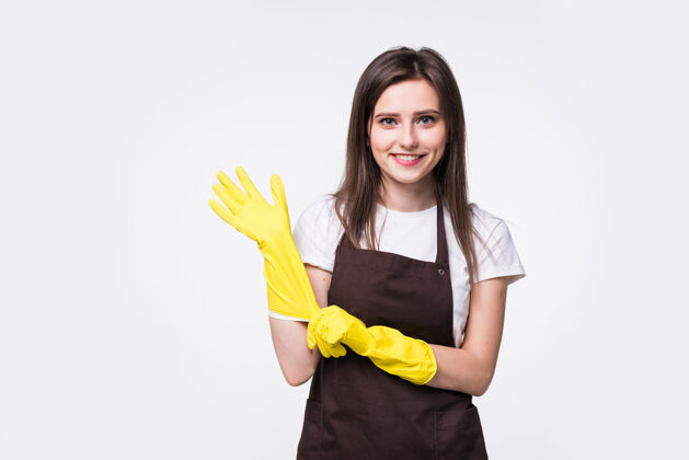 人年轻漂亮的家庭主妇肖像戴橡胶手套的女管家清洁的家庭主妇工人生活方式的概念消毒家庭美丽