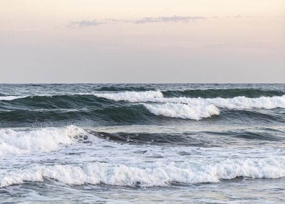 海洋海滩沙滩紧挨着宁静的海洋白天白天海洋