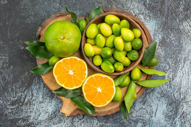 饮食顶部特写查看柑橘类水果不同种类的柑橘类水果的砧板生产可食用水果关键酸橙