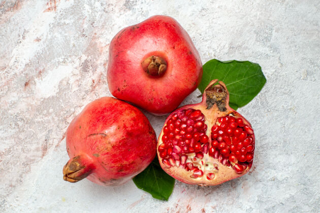 健康顶视图新鲜石榴在白色空间水果树木苹果