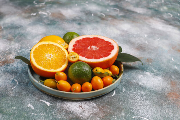 黄色各种新鲜柑橘类水果 柠檬 橙子 酸橙 柚子 金橘橘子有机成熟