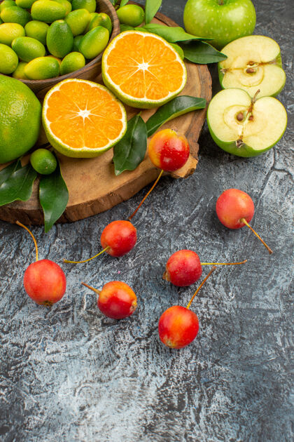 黄色侧面特写水果开胃柑桔苹果樱桃板上壁板水果普通话