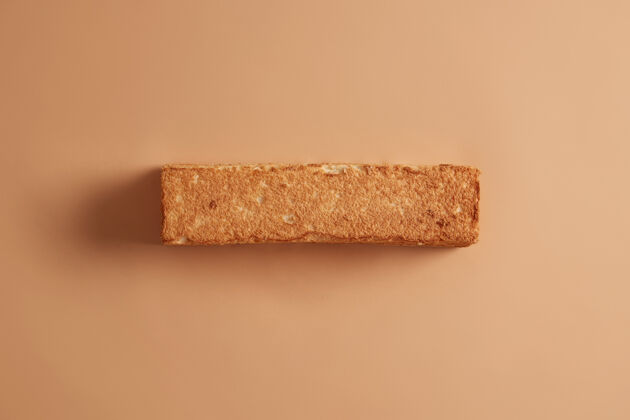 美味面包皮小麦自制面包照片从上面米色背景面包和食品的概念有机食用多碳水化合物产品健康的营养复制空间为您的宣传自制零食美食