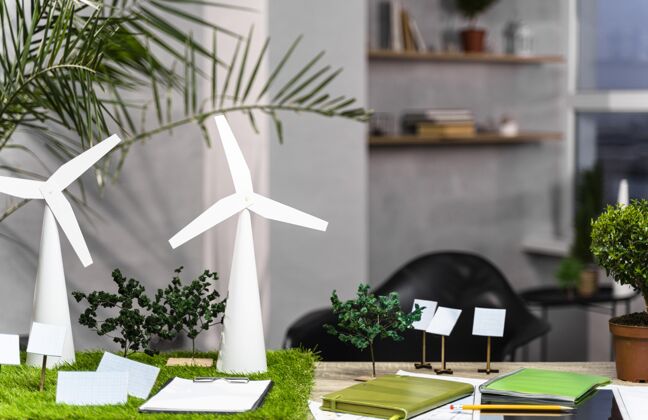 风力发电一个环保型风力发电项目布局的正面图 桌上有风力涡轮机环保风力涡轮机环保