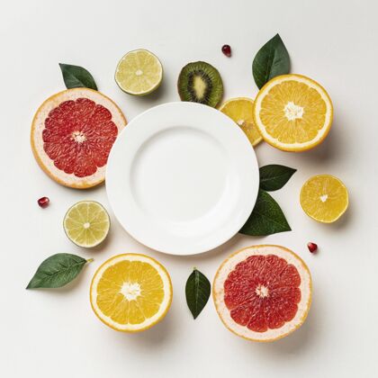 柑橘平铺的柑橘和盘子健康农产品营养