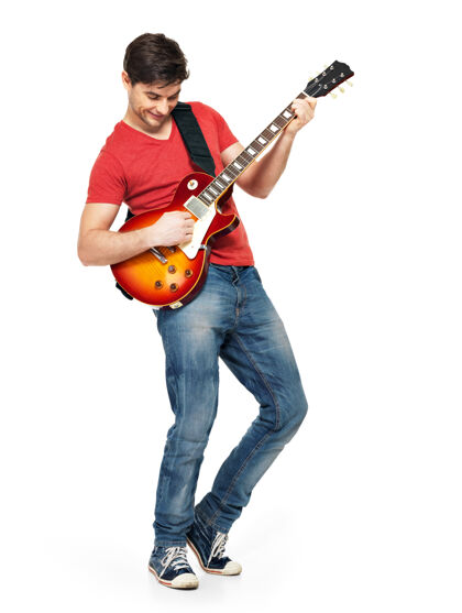 演奏年轻的吉他手在电吉他上演奏 情绪明亮 与世隔绝活跃情感人物