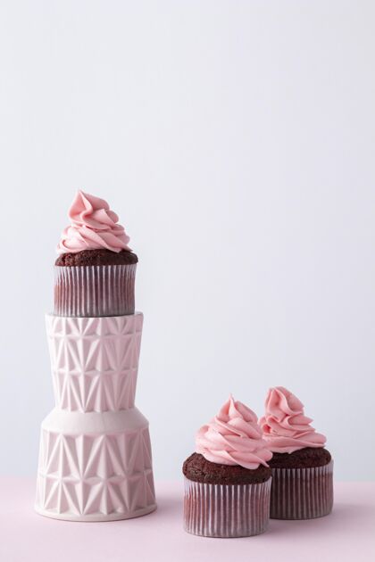 纸杯蛋糕美味的粉红色纸杯蛋糕美味糖美味