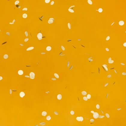 周年纪念橙色墙上金色派对五彩纸屑的排列活动节日庆祝