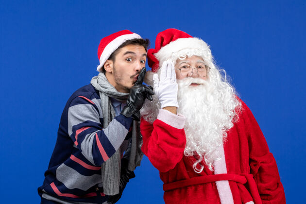 圣诞老人前视图圣诞老人和年轻的男性男人礼物人