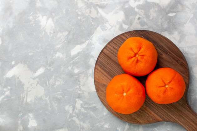 水果顶视图新鲜的橘子 整个酸的和圆润的柑橘 浅白色背景新鲜柑橘橘子